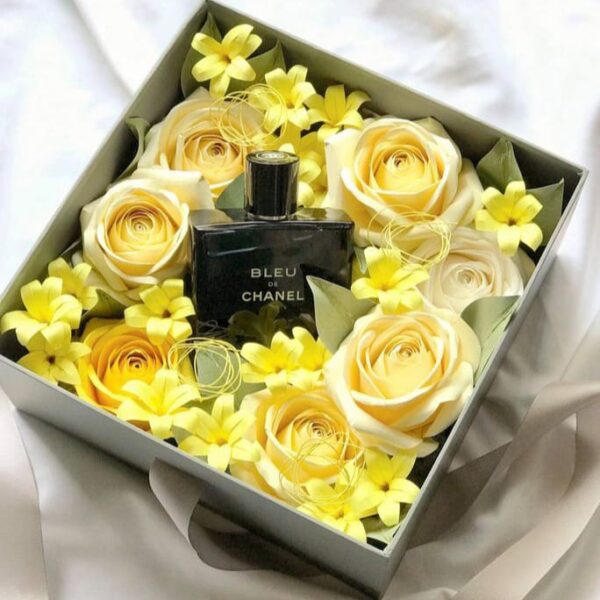 Bleu De Chanel Perfume with Yellow flowers.