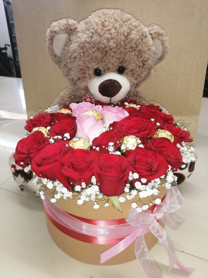 Cute Teddy Bear with flowers and Ferrero Chocolate Gift Hamper Flower
