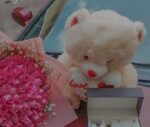 Flowers, teddy bear and jewelry