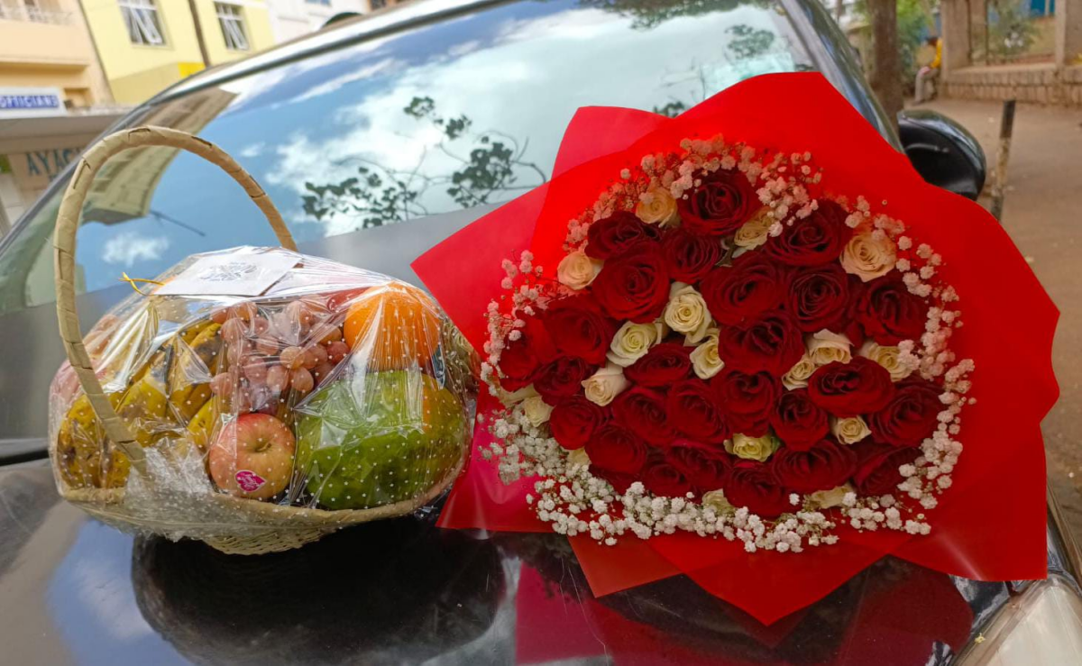 fruit basket with a flower bouquet