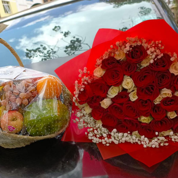 fruit basket with a flower bouquet